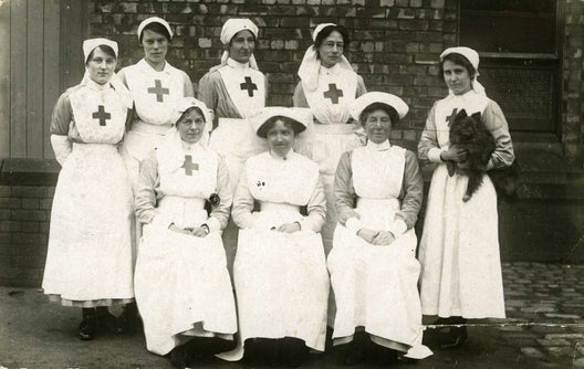 Members of the Voluntary Aid Detachment outside Bramhall and Cheadle Hulme Red Cross hospital.